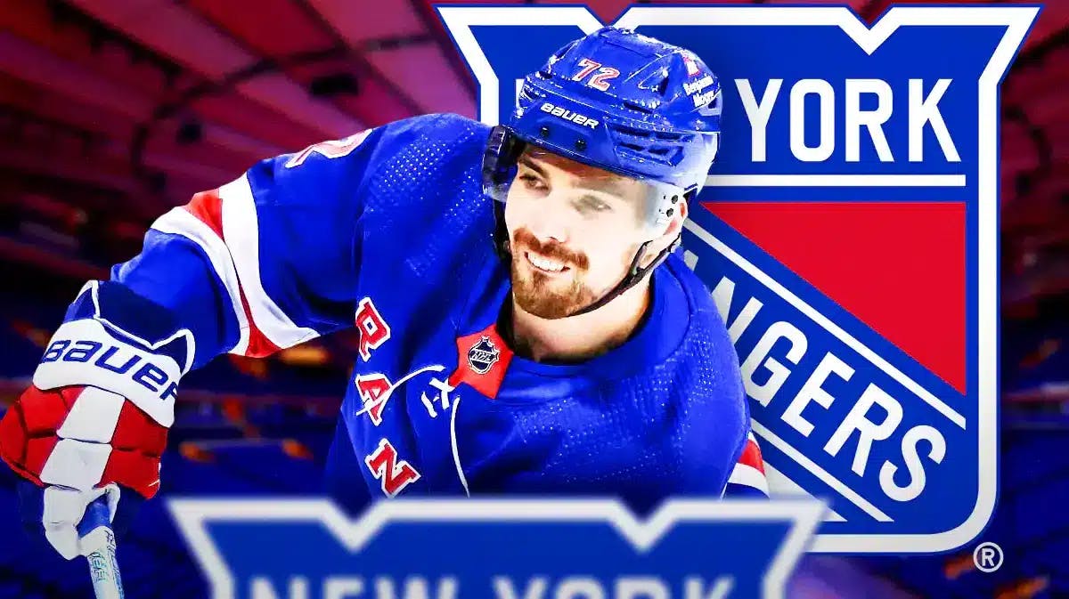 Filip Chytil in middle of image looking hopeful, NY Rangers logo in image, hockey rink in background
