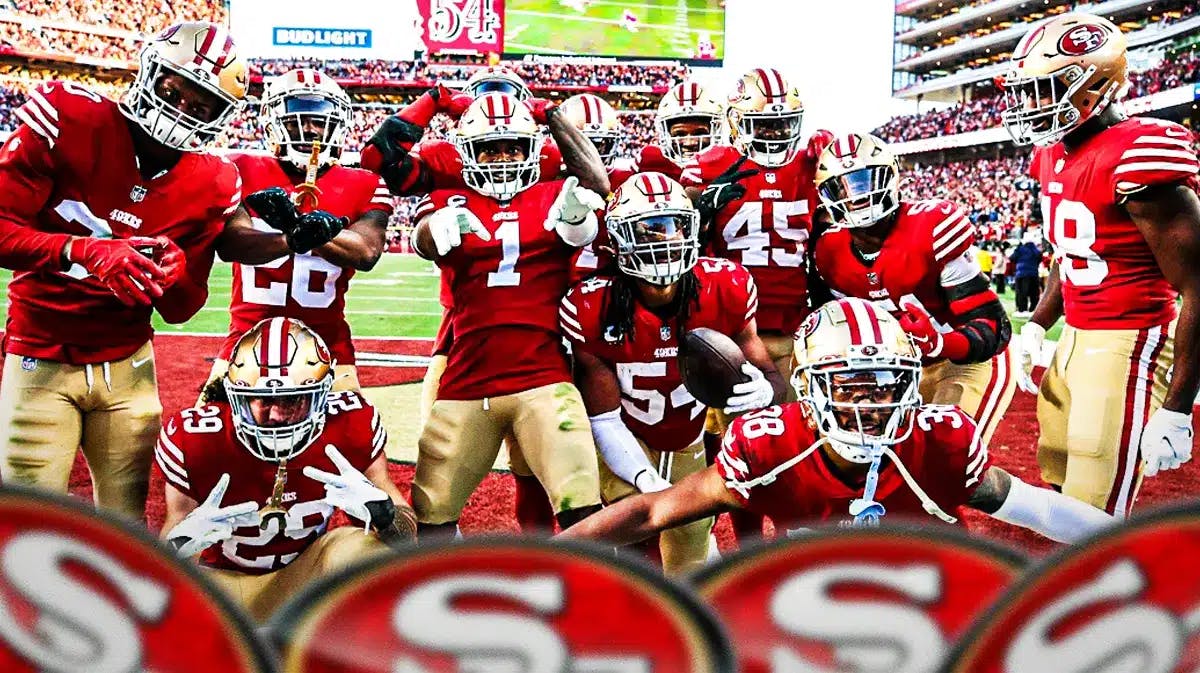 49ers players celebrating with the team's logo in the foreground.