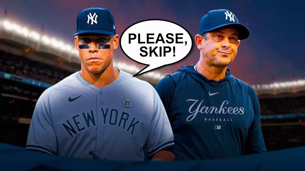 Photo: Aaron Judge saying “Please, skip!” in Yankees jersey, Aaron Boone beside him, Yankee Stadium as background