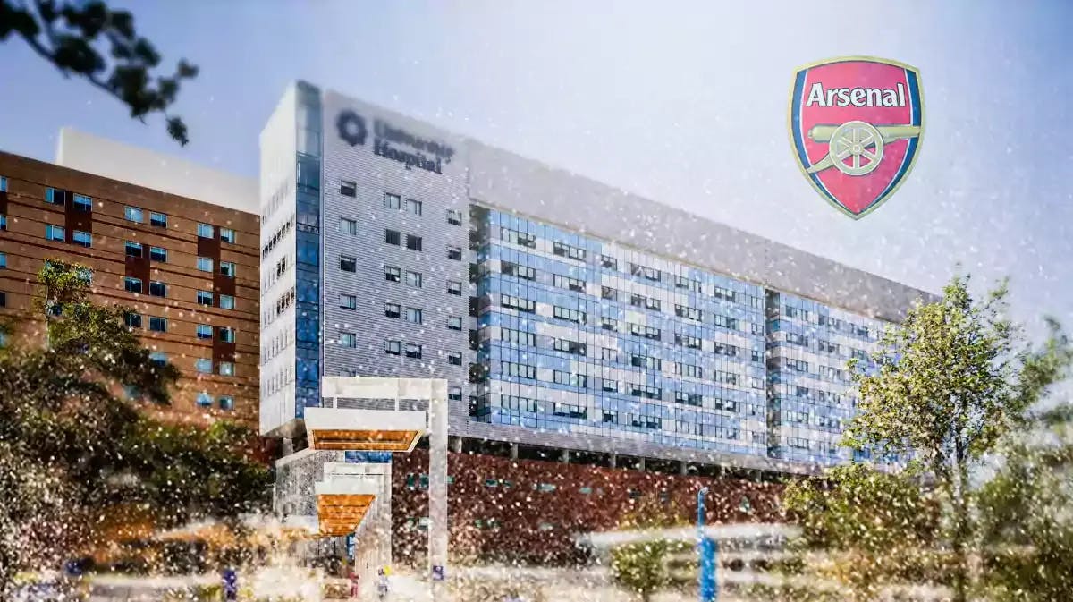 A hospital, the Arsenal logo in the sky