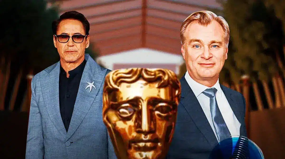 Christopher Nolan and Robert Downey Jr. with a BAFTA award.