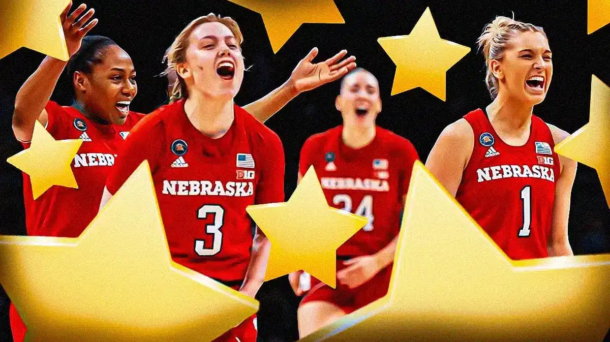 The Nebraska women’s basketball, looking excited, with stars all around them
