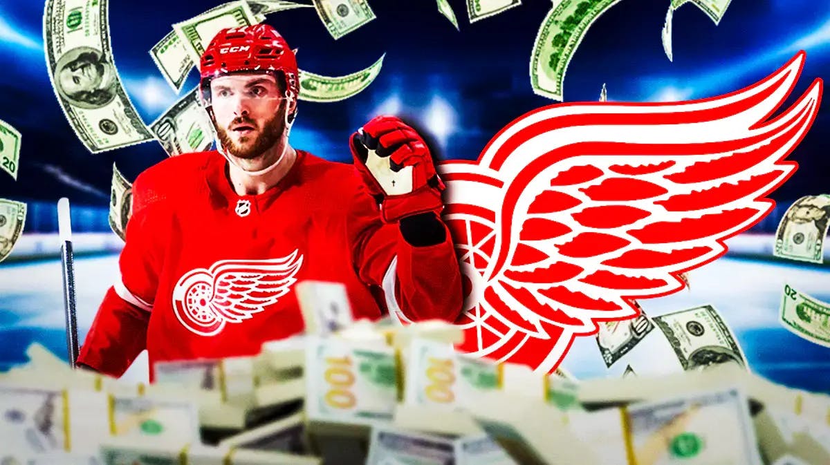 Michael Rasmussen in middle of image looking happy with fire around him, DET Red Wings logo, money in image to represent contract, hockey rink in background