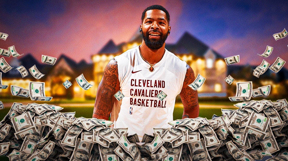 Marcus Morris surrounded by piles of cash.