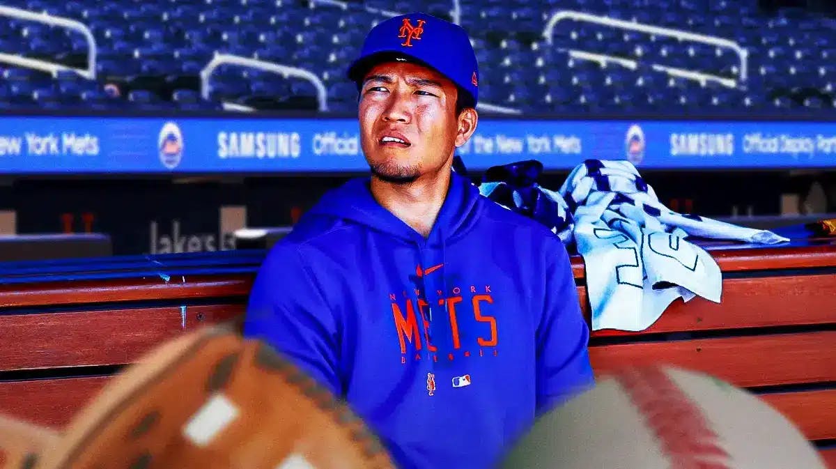 Mets' Kodai Senga sitting in an MLB dugout looking serious.