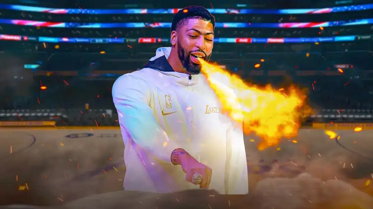 Lakers' Anthony Davis wearing his championship ring and with fire coming out his mouth