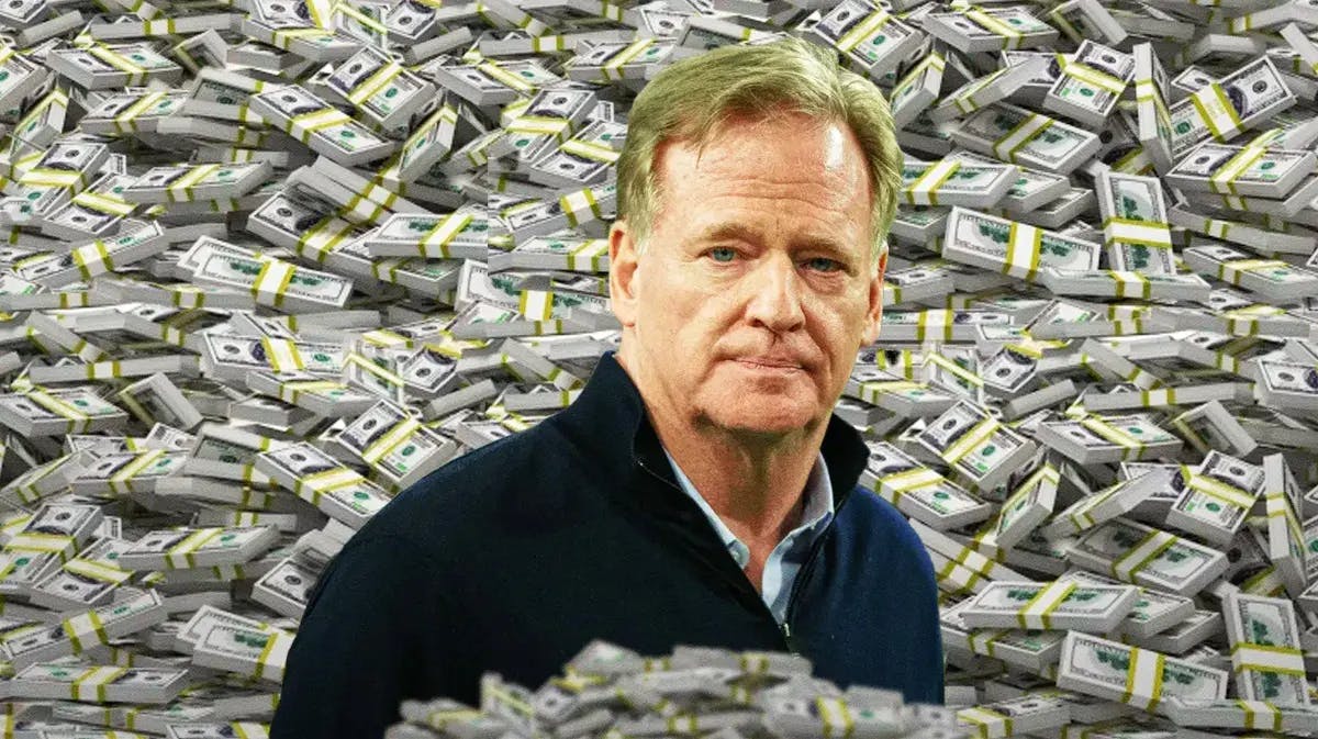 NFL commissioner Roger Goodell surrounded by cash after a record salary cap increase