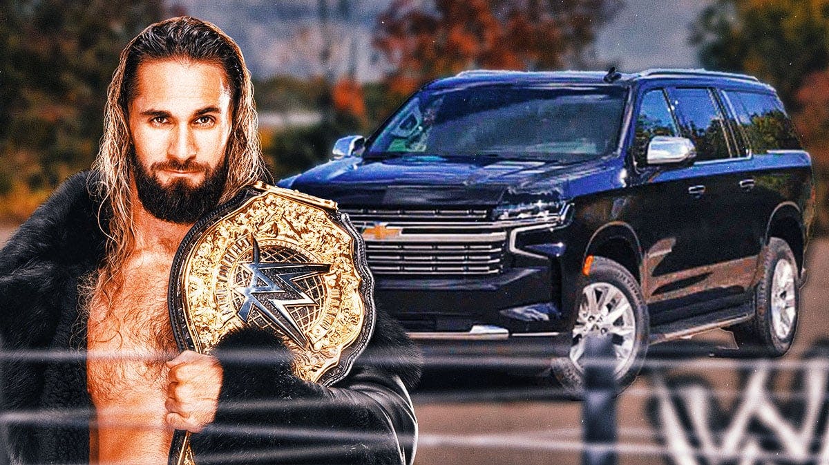 Seth 'Freakin'' Rollins in front of a vehicle from his car collection.