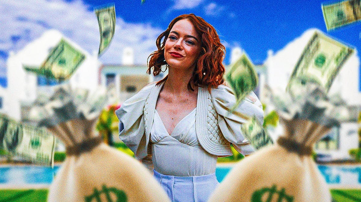 Emma Stone surrounded by bags of cash.