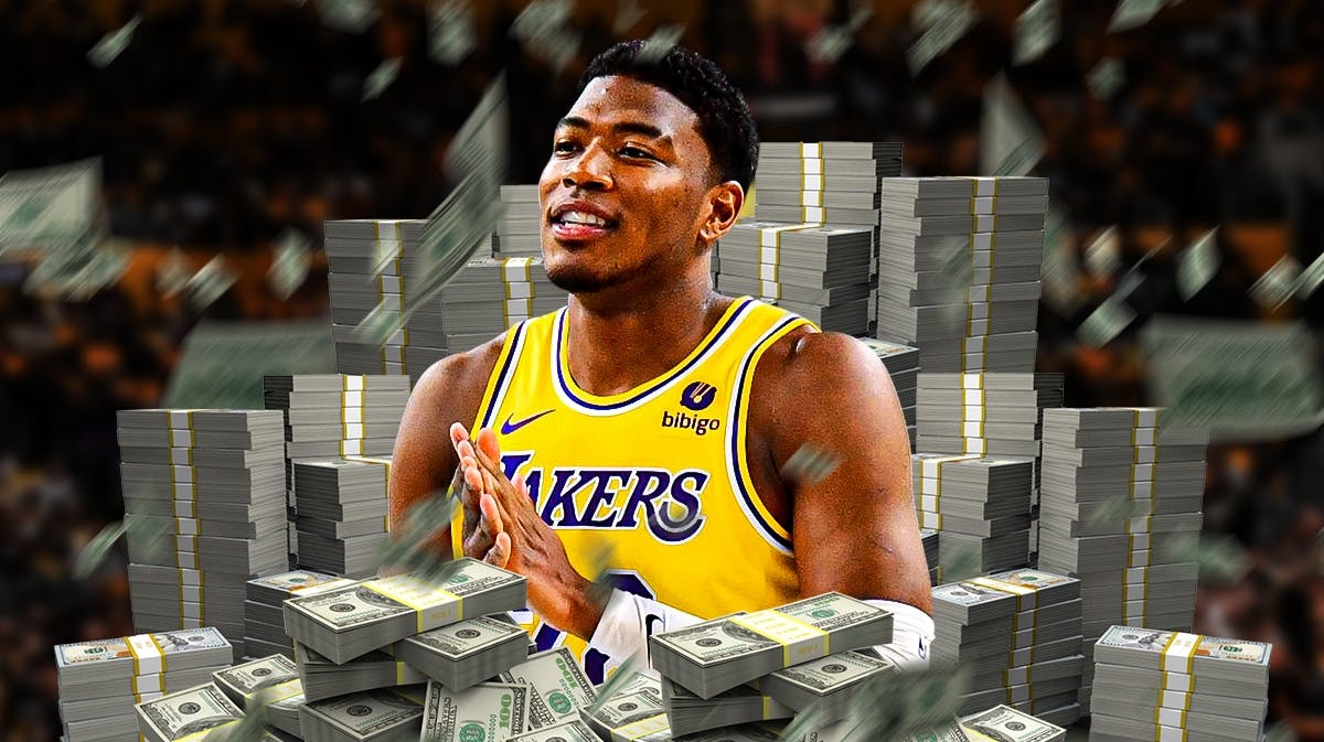 Rui Hachimura surrounded by piles of cash.