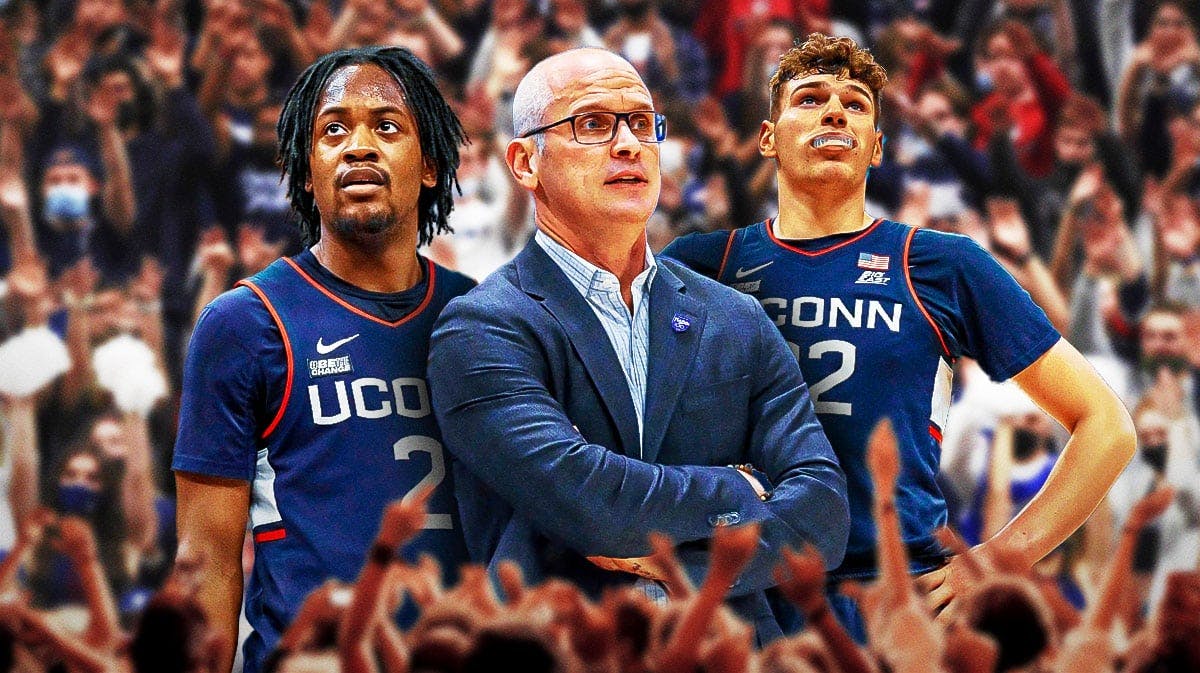 Dan Hurley in the middle, Tristen Newton and Donovan Clingan on either side (UConn basketball)