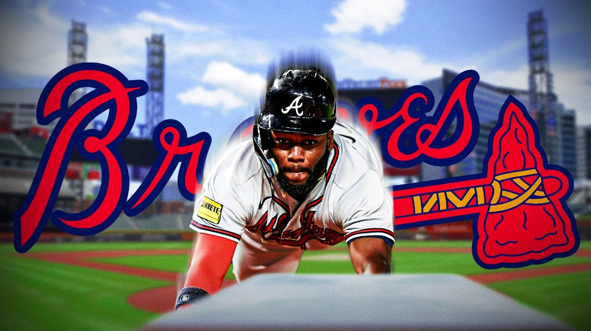 Michael Harris II stealing a base in front of the Braves logo