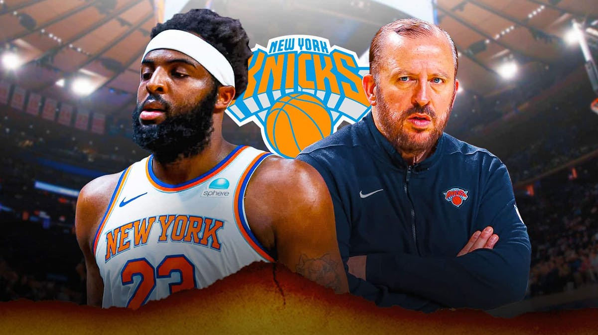 Knicks' Mitchell Robinson stands next to coach during NBA Playoffs game against 76ers