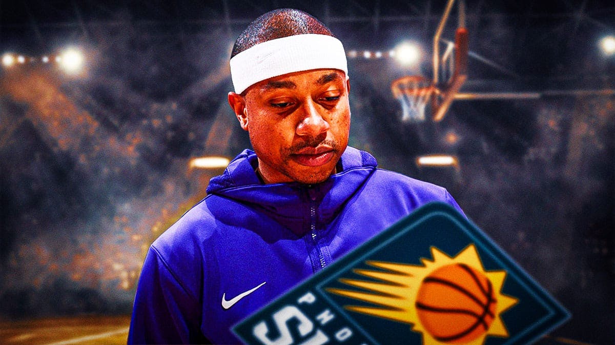 Phoenix Suns guard Isaiah Thomas with a logo for the Phoenix Suns.