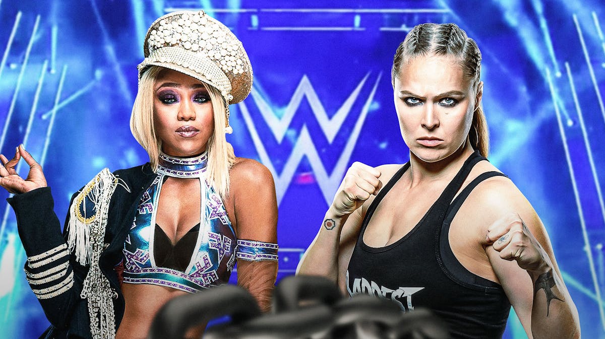 Alicia Fox next to Ronda Rousey with the WWE logo as the background.