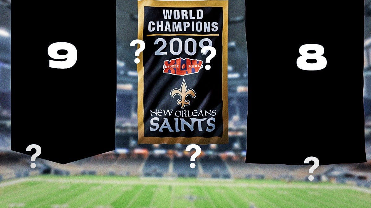 Banners hanging inside the Superdome. The Saints Super Bowl Champs banner from 2009. A banner with a '9' for Drew Brees and '8' banner for Archie Manning. Then two more that are blank or have question marks.