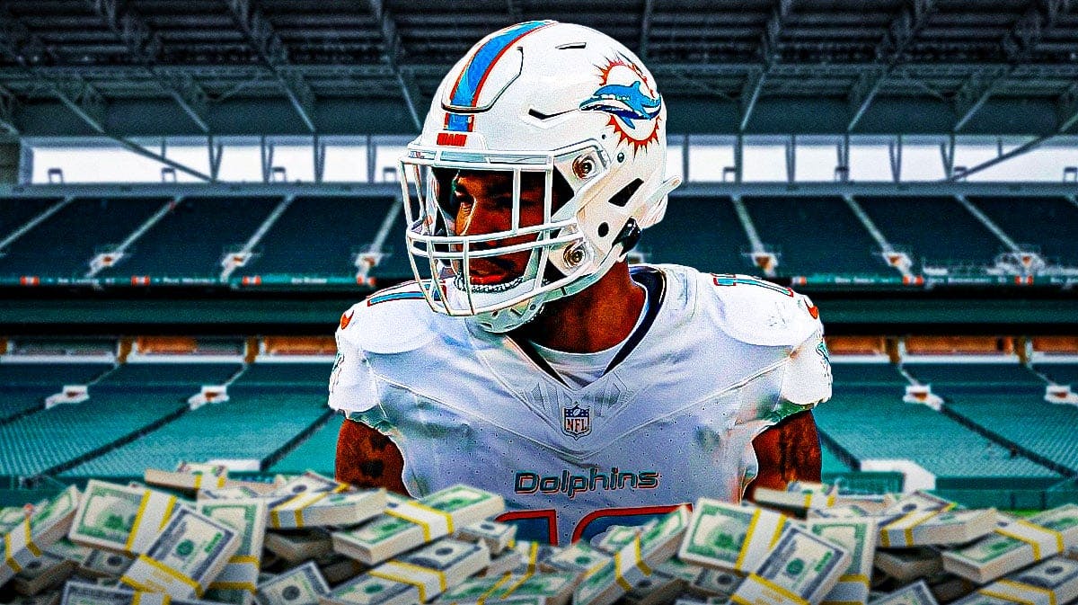Dolphins' Jaylen Waddle with money/money bags all around.
