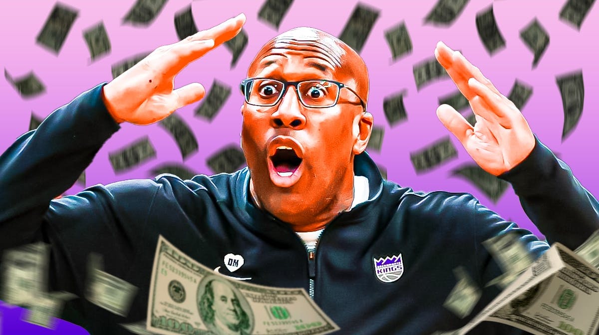Kings' Mike Brown smiling with dollars falling from the sky