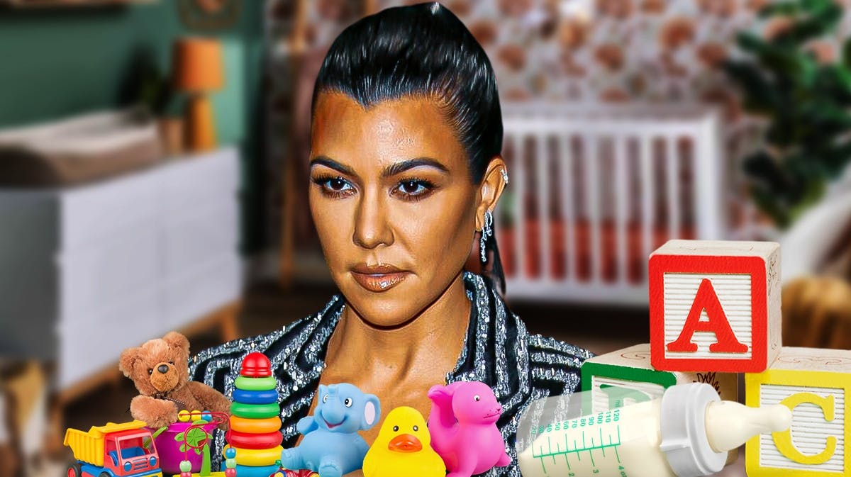 Kourtney Kardashian with baby stuff behind her