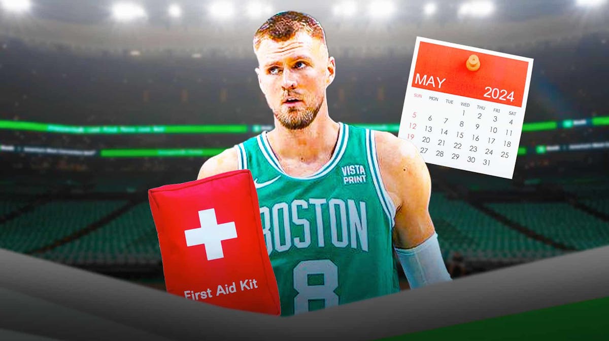 Celtics' Kristaps Porzingis with red medical bag and calendar.