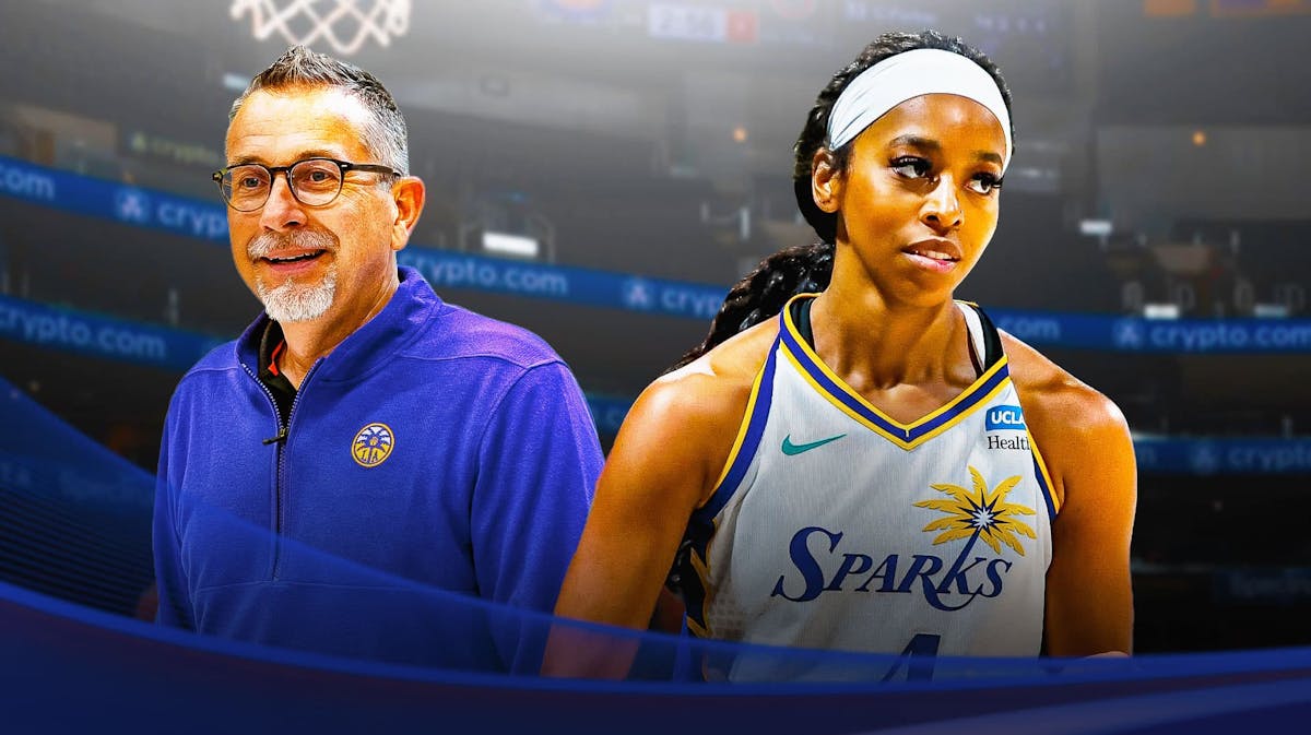 Lexie Brown alongside Sparks coach Curt Miller with the Sparks arena in the background