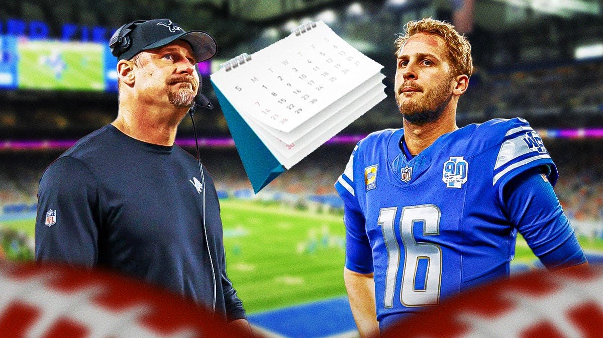 Detroit Lions head coach Dan Campbell, QB Jared Goff with a calendar that looks like it's flipping