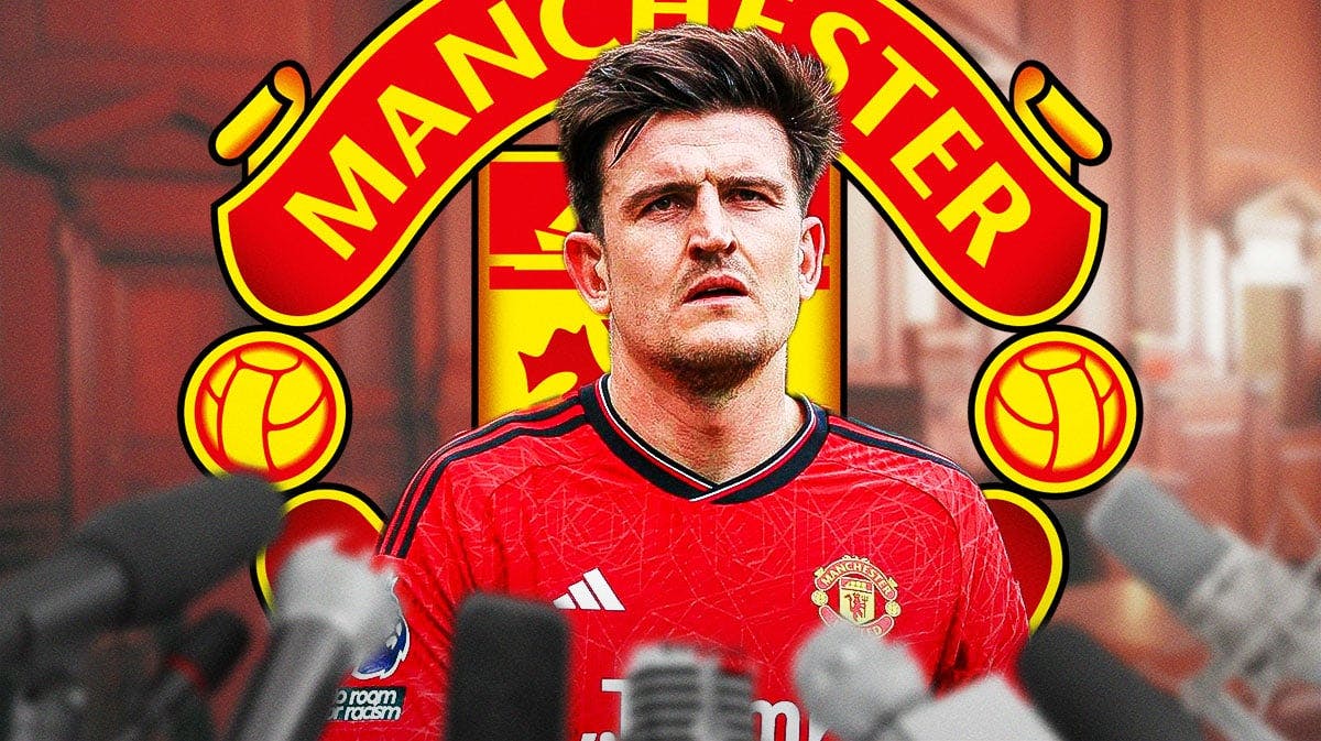 Harry Maguire sitting in a conference meeting. Put logo of Manchester United alongside.