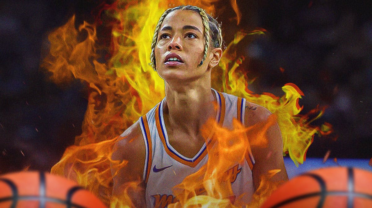 Phoenix Mercury player Natasha Cloud, with fire/flames around her, looking tough/determined
