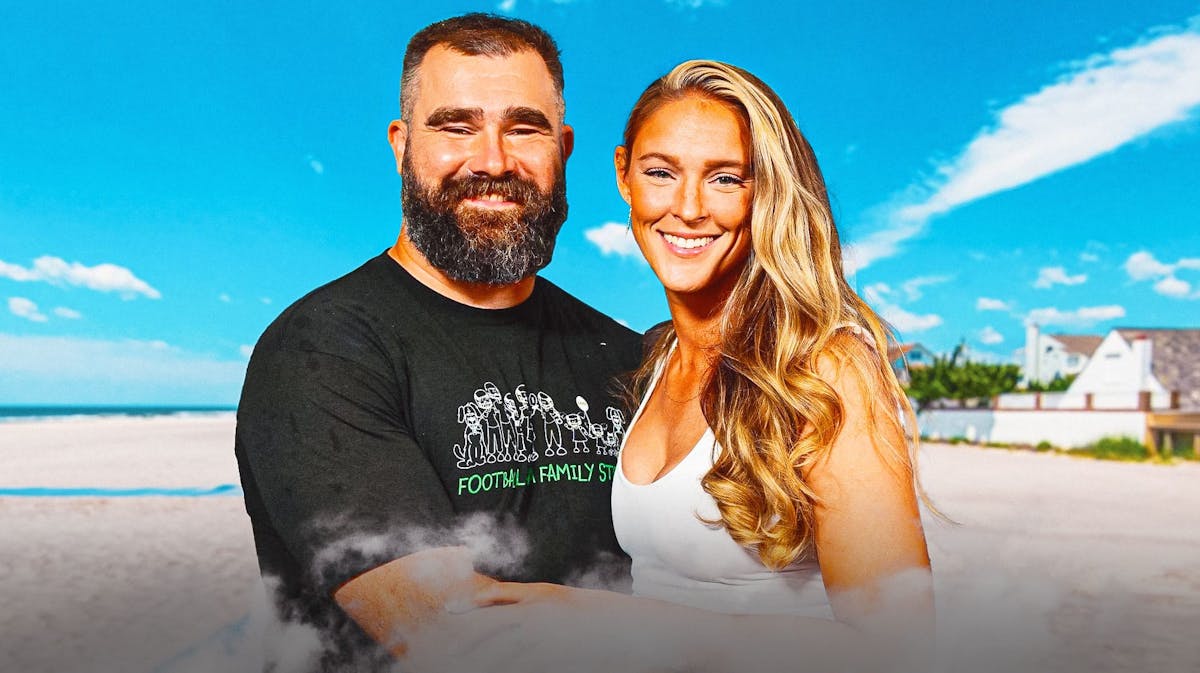 Ex-Eagles center Jason Kelce and wife Kylie stand in front of Margate City, New Jersey