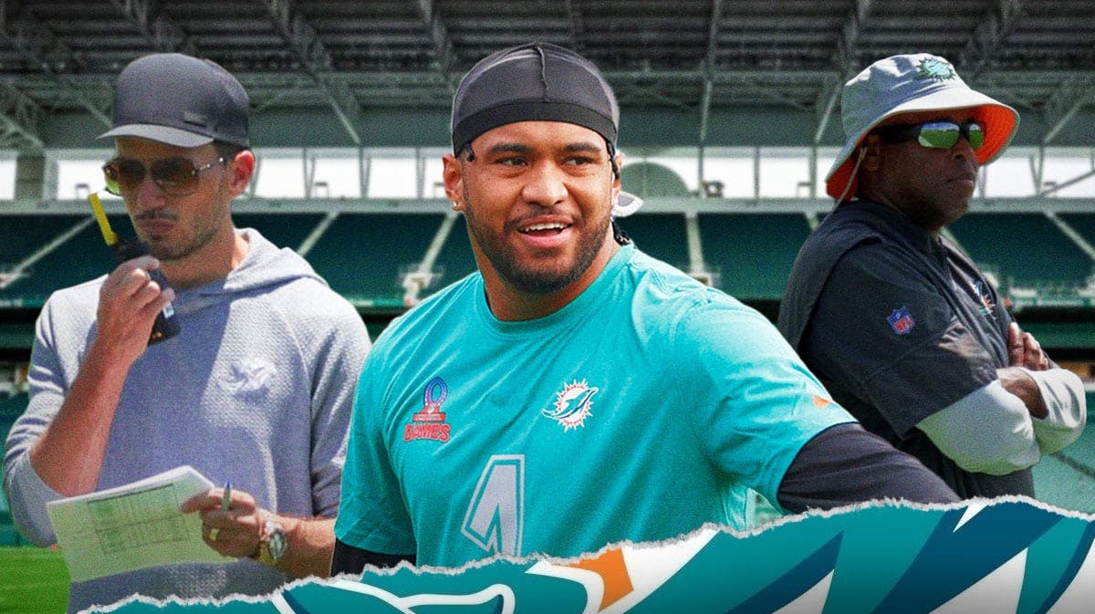 Miami Dolphins star Tua Tagovailoa, head coach Mike McDaniel, and general manager Chris Grier in front of the team's practice field.