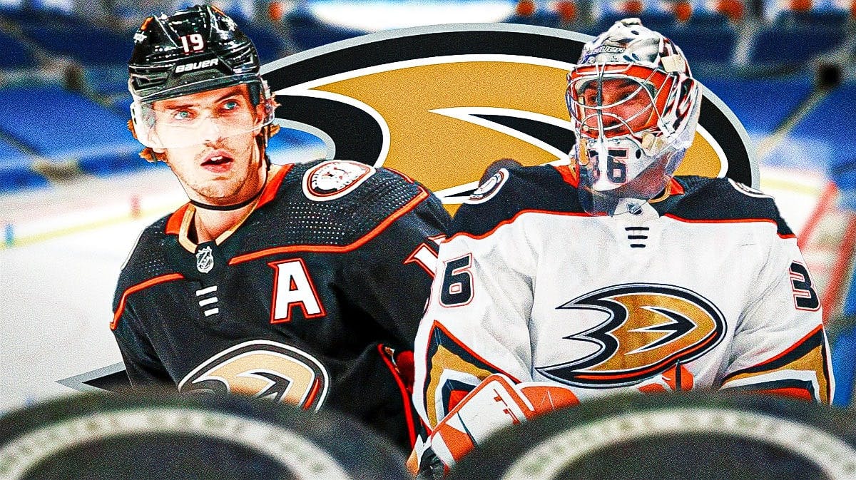 Trevor Zegras and John Gibson both looking stern, Anaheim Ducks logo, 3-5 question marks, hockey rink in background