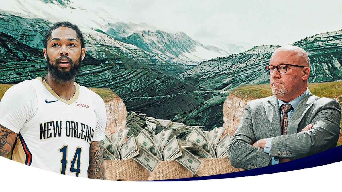 Pelicans Brandon Ingram and David Griffin next to bags of money
