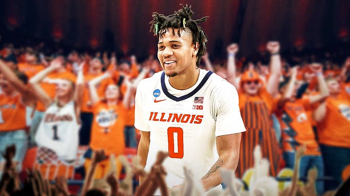 Illinois basketball star Terrence Shannon Jr. smiling with fans behind him.