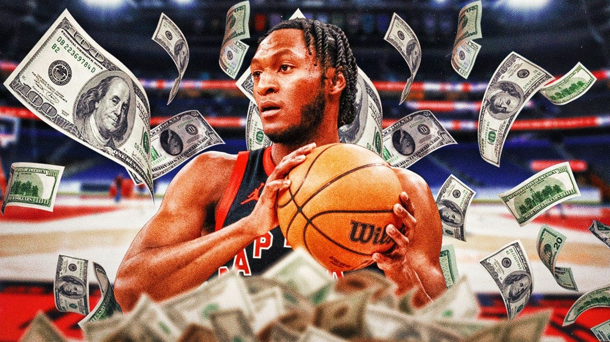 Raptors' Immanuel Quickley with cash flying all around