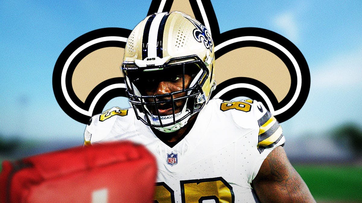 New Orleans Saints tight end Juwan Johnson with an injury symbol next to him. There is also a logo for the New Orleans Saints.
