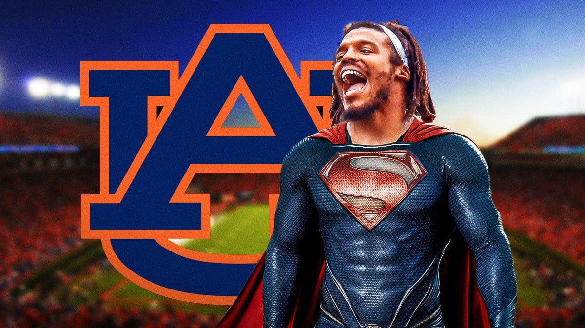 Cam Newton in Superman suit next to Auburn logo