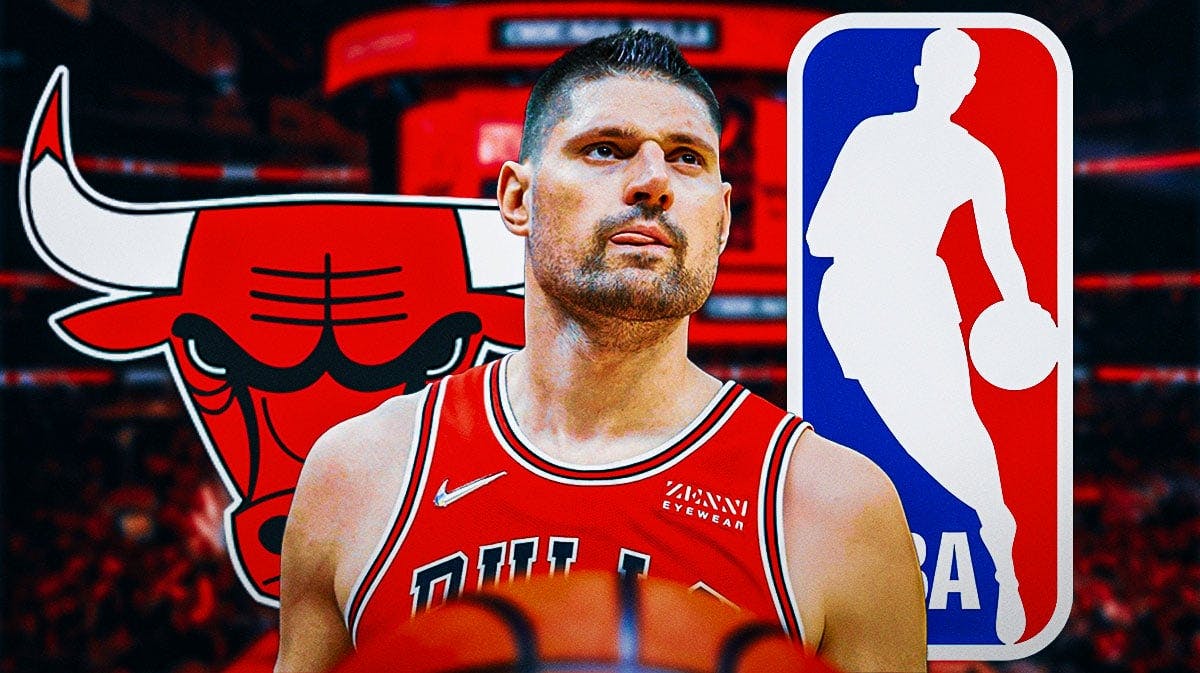 Bulls' Nikola Vucevic looks at trade reporters, Thunder, Raptors executives in background