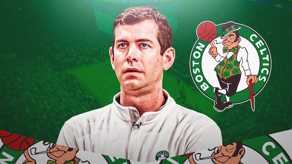 Brad Stevens looking serious with celtics logo in the background