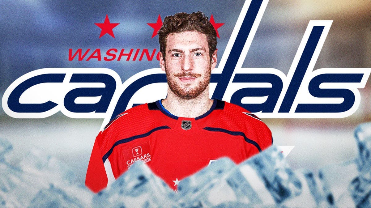 Pierre-Luc Dubois looking hopeful in a Washington Capitals jersey if possible (no A or C on jersey), Washington Capitals logo, hockey rink in background