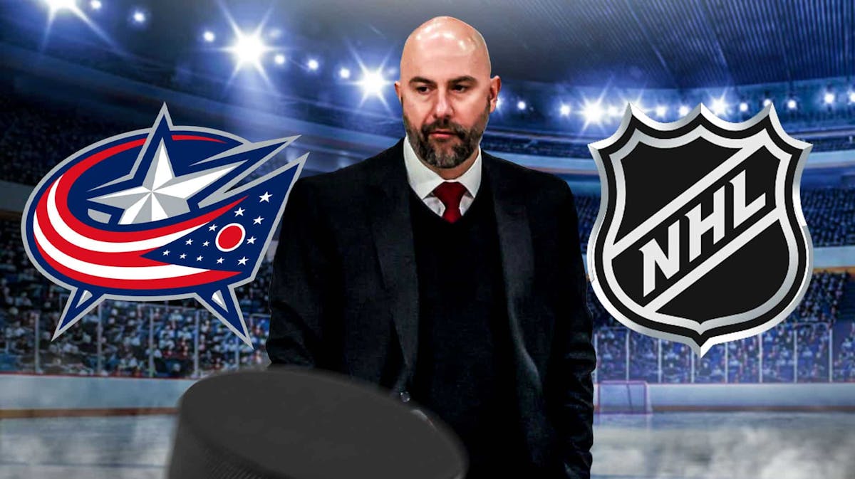 Blue Jackets coach Pascal Vincent stands next to NHL logo after fire news, Metropolitan Division fans in background