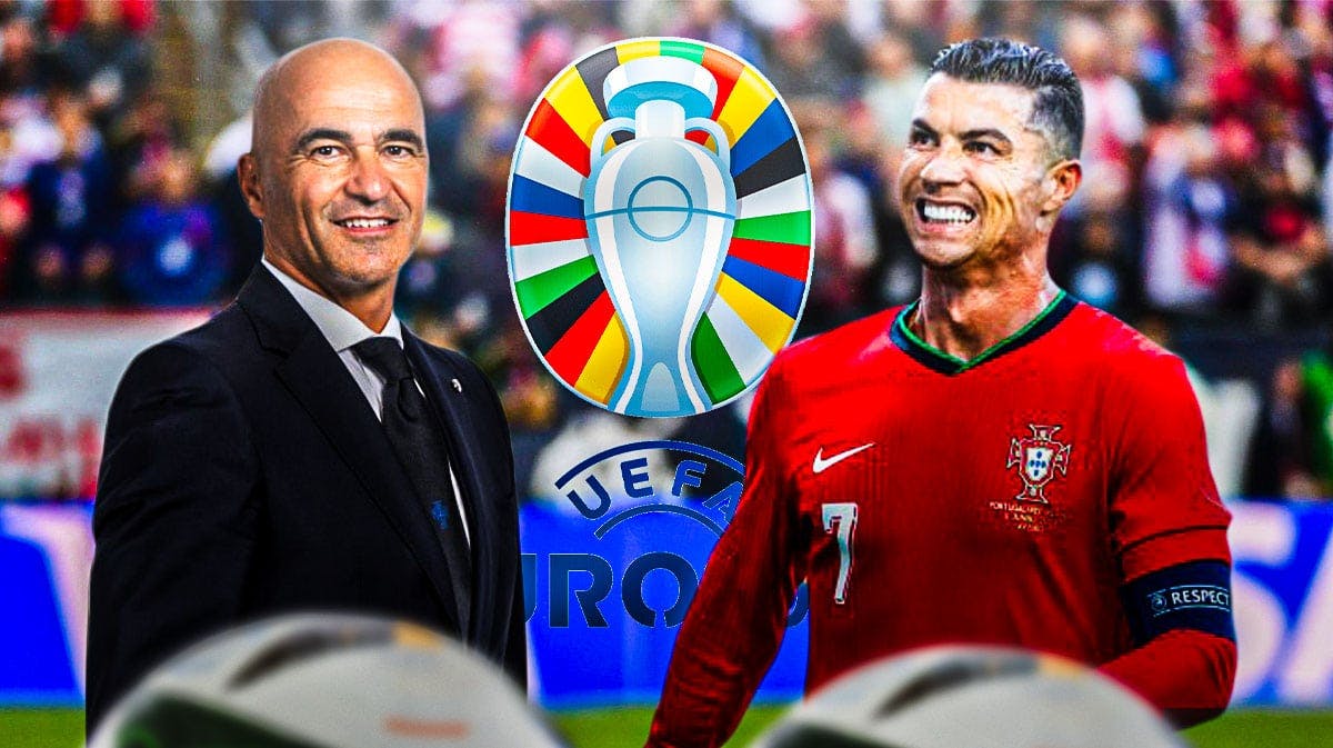 Cristiano Ronaldo and Roberto Martinez smiling in front of the Euro 2024 logo