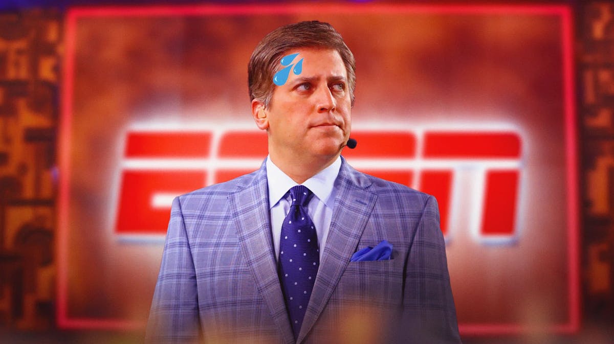 Serious Steve Levy of ESPN with sweat emoji on the sidfe of his forehead