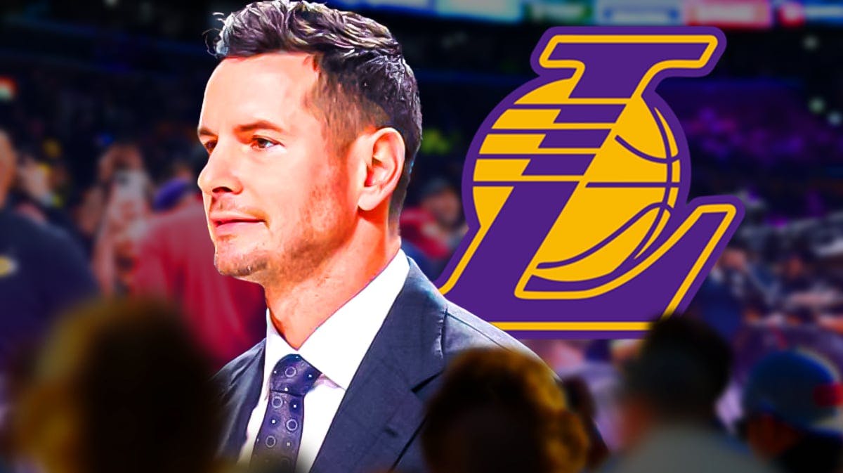 JJ Redick in the Lakers bench. Lakers logo in the background.