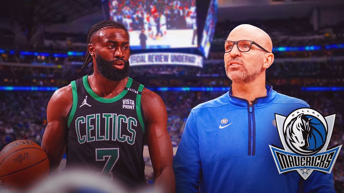 Mavericks' Jason Kidd stands next to Celtics' Jaylen Brown during NBA Finals