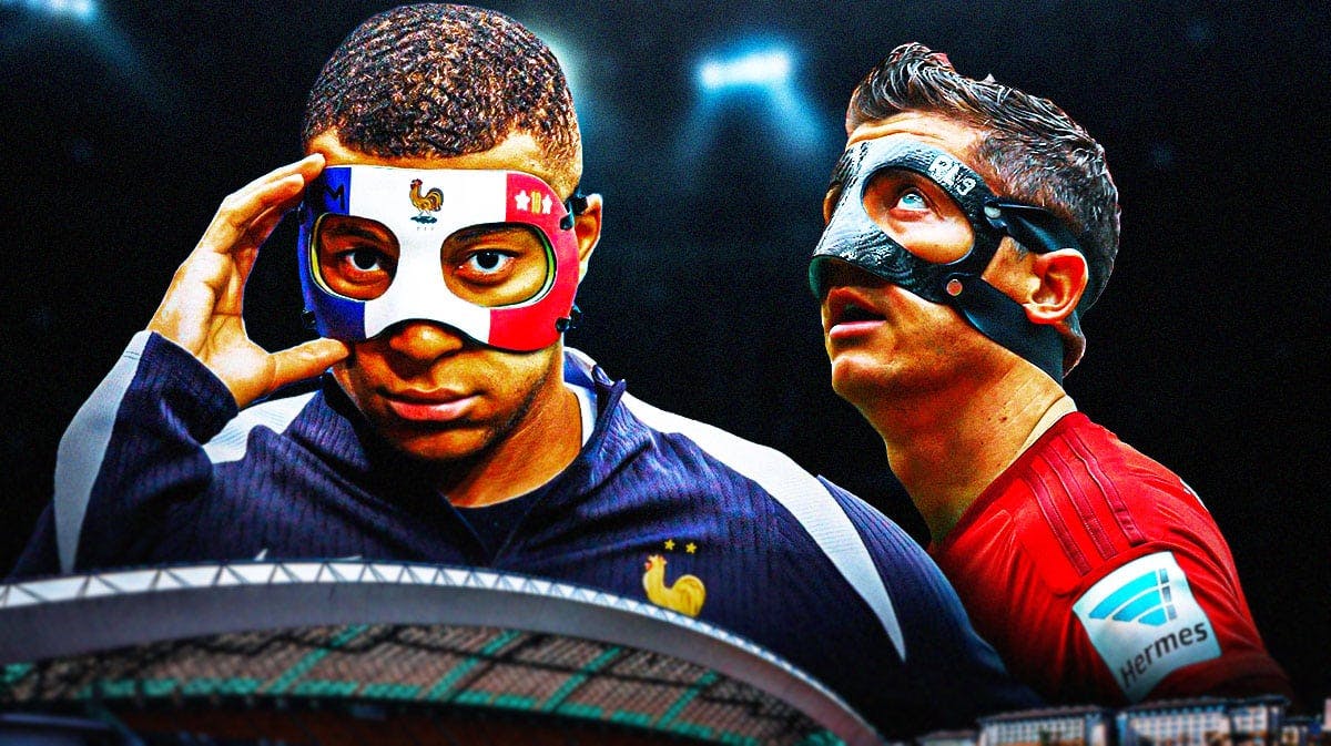 Kylian Mbappe and Robert lewandowski next to each other, both wearing a facemask