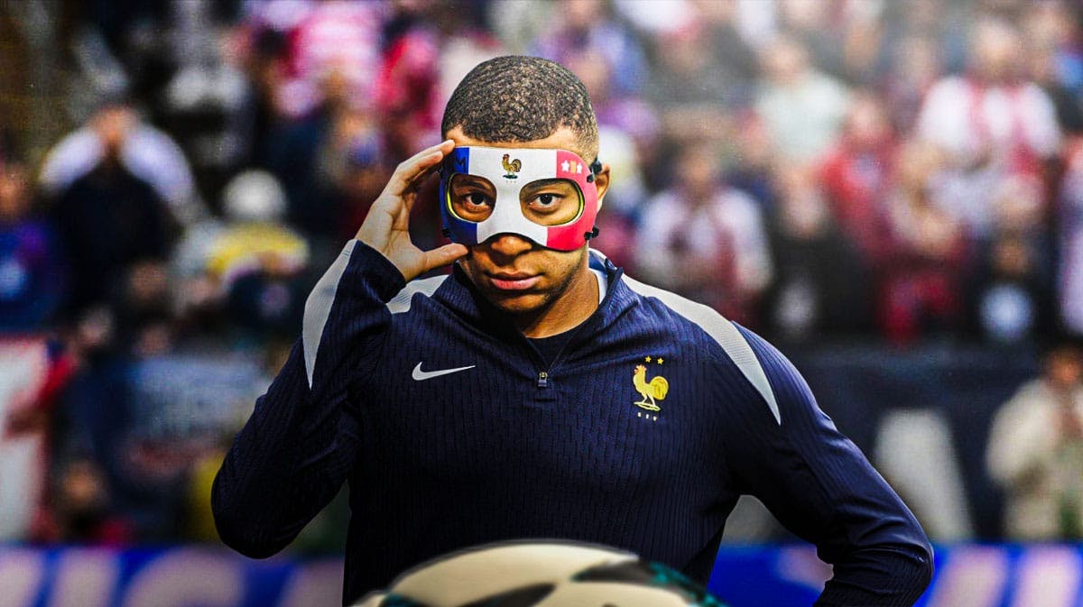 Kylian Mbappe wearing his new France facemask in front of the Euro 2024 logo