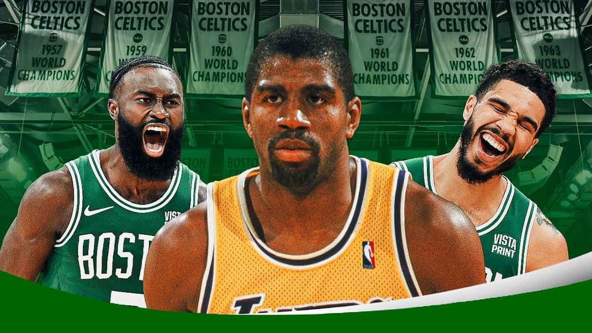 Lakers' Magic Johnson with Celtics' Jaylen Brown and Jayson Tatum