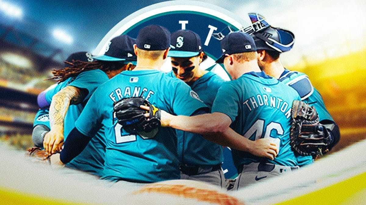 Seattle Mariners players with team logo in the background.