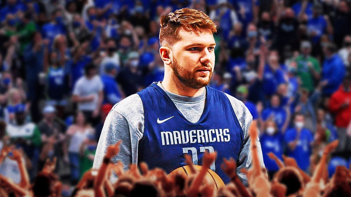 Mavericks' Luka Doncic looking serious. Close-up image. Have him inside of the American Airlines Center with Mavericks fans in background.