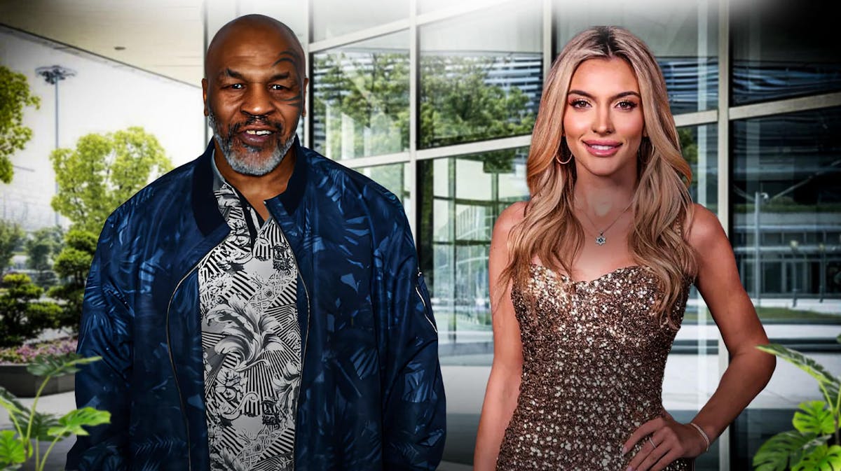Mike Tyson and Emily Austin side-by-side both smiling widely.